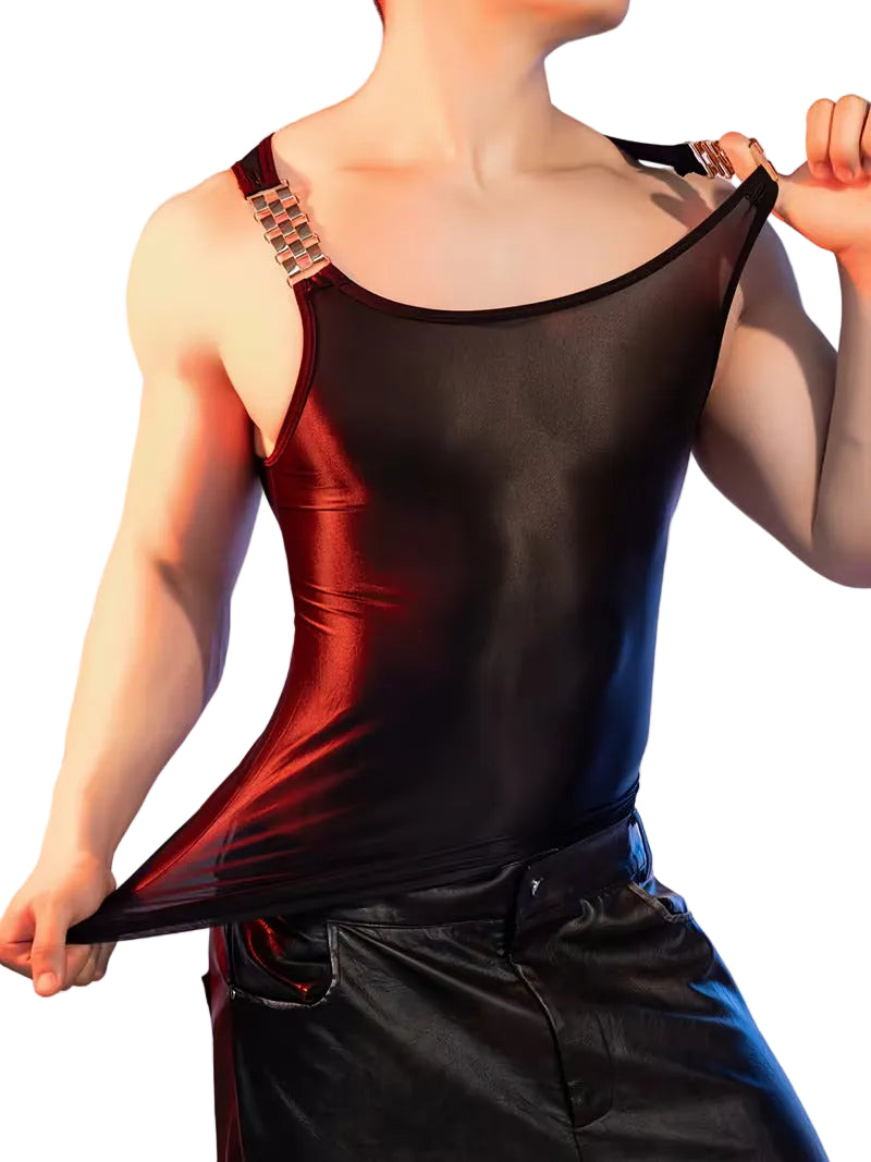 Person wearing a black and red two-tone sleeveless top against a light purple background